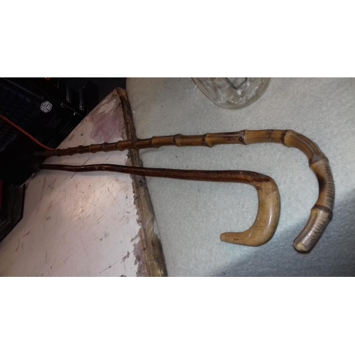 29 - 2 x vintage hook handle walking sticks