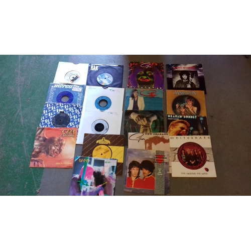 53 - Bundle of assorted rock vinyl singles inc' Gillan, UFO, Lynard Skynard etc