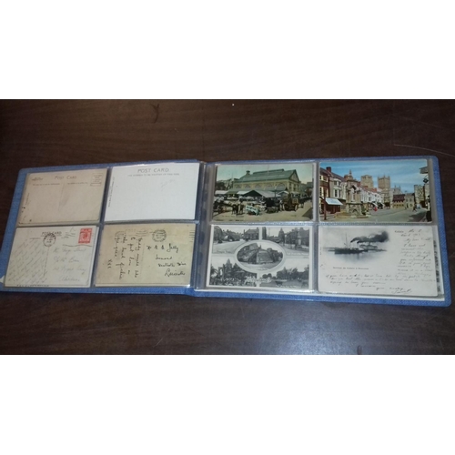 62 - Vintage photograph album full of assorted vintage postcards, some unposted