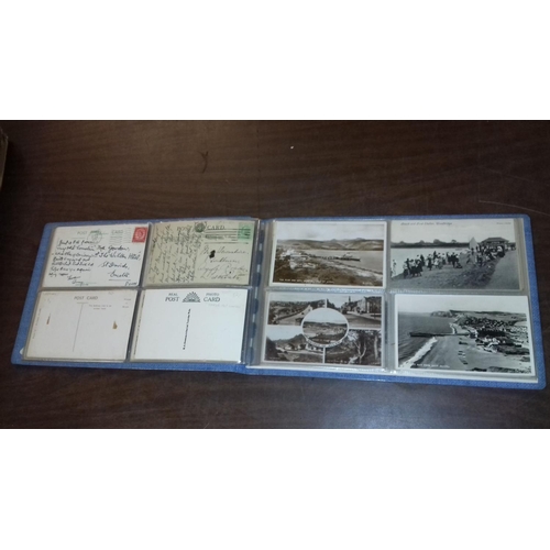 62 - Vintage photograph album full of assorted vintage postcards, some unposted