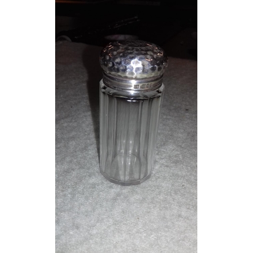 622 - Hallmarked silver topped bottle