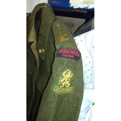 187 - Woolen Army jacket with badges