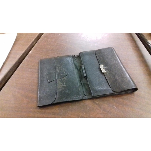 241 - Edwardian leather wallet with metal clasp