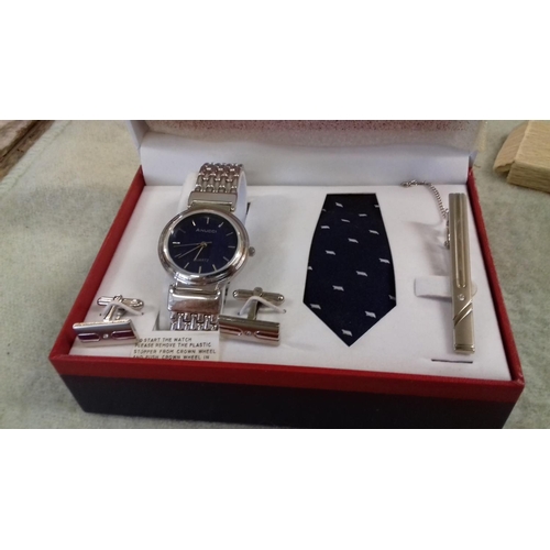 35 - Anucci gents wrist watch, cufflinks, tie and tie pin gift set