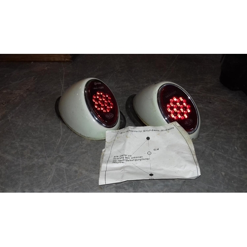 34 - Pair of 1950s Hassia Volkswagen Beetle tail lights with alignment leaflet