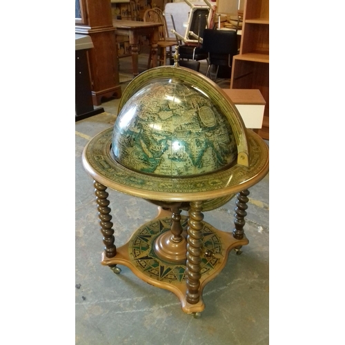 484 - Portable reproduction drinks globe with some crystal glasses approx 100 cm tall