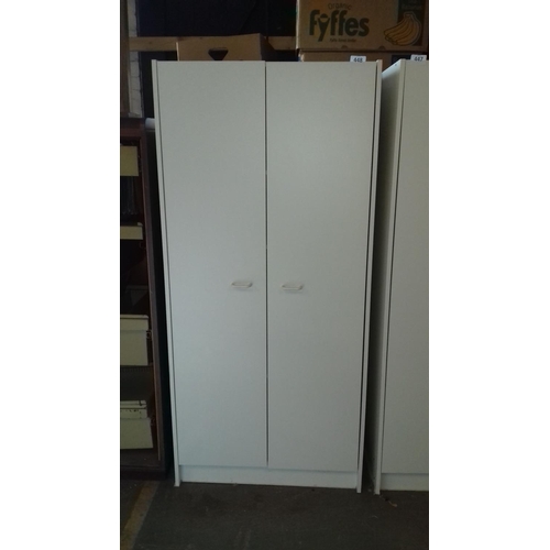 448 - 75 x 45 x 161 cm tall white wardrobe with shelves if required