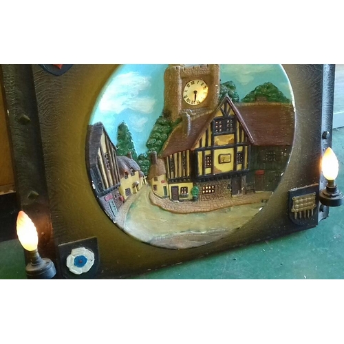 16 - 47 cm diameter 3 dimensional village scene light up plate, mounted onto wooden look panel. Lights wo... 