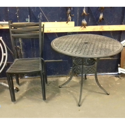 463 - Round aluminium garden table and 4 x stacking chairs