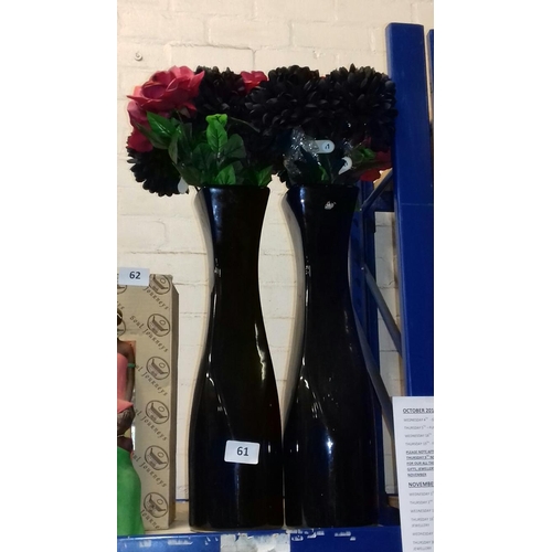 61 - Pair of 53 cm tall black ceramic vases with artificial flowers