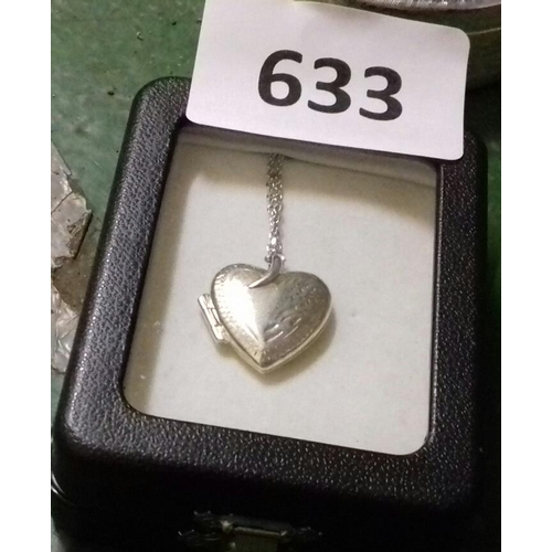 633 - 925 stamped silver heart shaped locket on chain