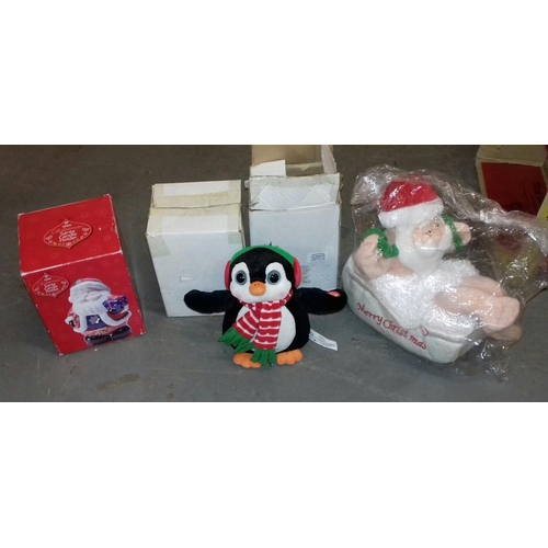 459 - Bundle of 4 x boxed items being candle holder, 2 x penguins and santa in bath