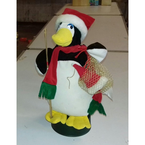 426 - 36 cm tall battery operated musical continuous play penguin (battery cover missing)