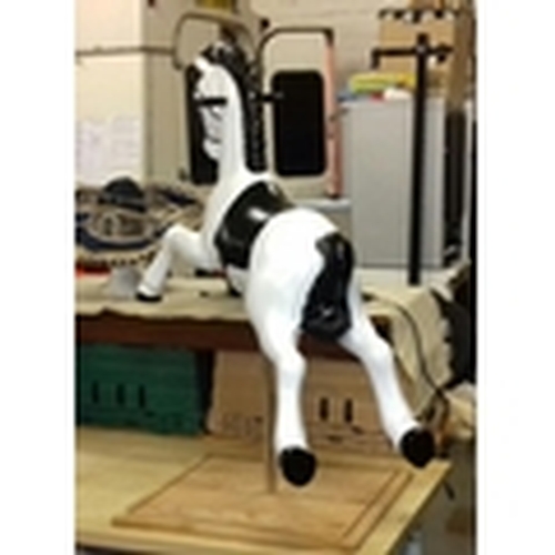 422 - Refurbished plastic 1960's spring horse on bespoke wooden display plinth, overall height 104 cm tall