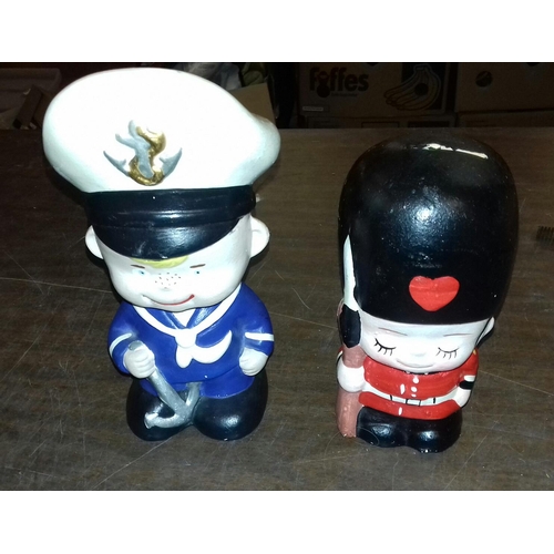 61 - 2 x vintage ceramic money boxes being 20 cm tall sailor without stopper and smaller soldier with sto... 