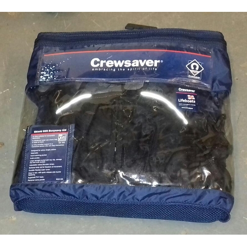 6 - Bagged and unused crew saver shield 50N buoyancy aid