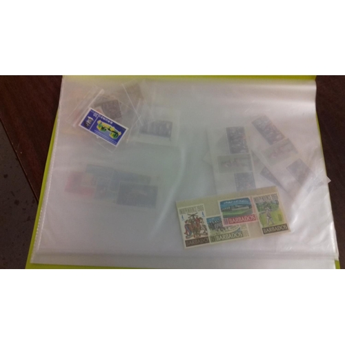 292 - Folder of assorted Commonwealth stamps