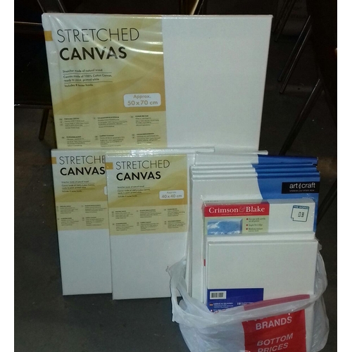 20 - Bundle of stretched canvases etc.