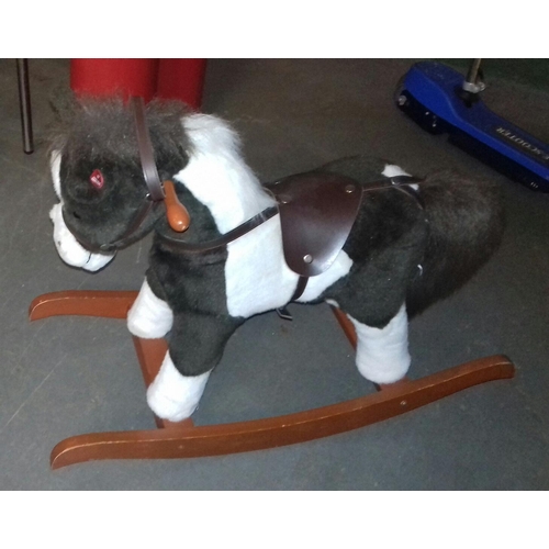 21 - Approx. 55 cm tall rocking horse with sound