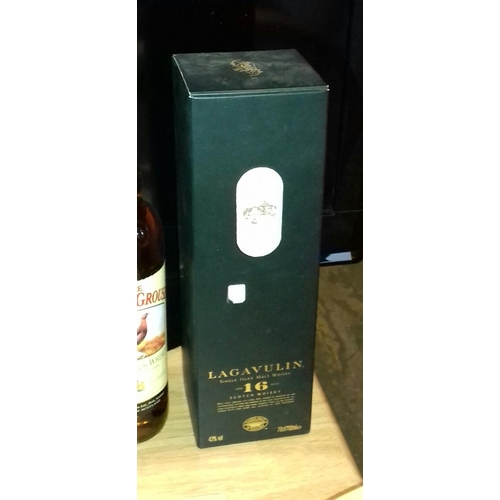 33 - Boxed and tagged 70cl lagavulin single Islay malt whisky