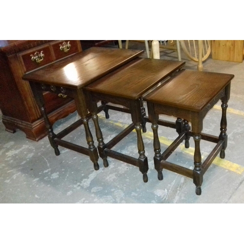 436 - Dark oak nest of 3 tables