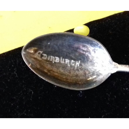 26 - Edinburgh hallmarked silver spoon with thistle end and engraved Edinburgh