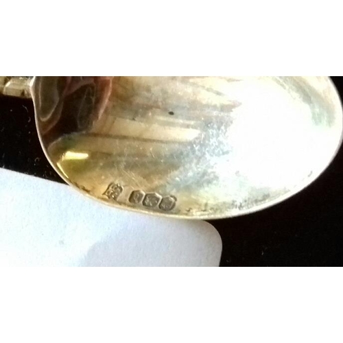 28 - Hallmarked Sheffield silver tea spoon with golf club shaped stem