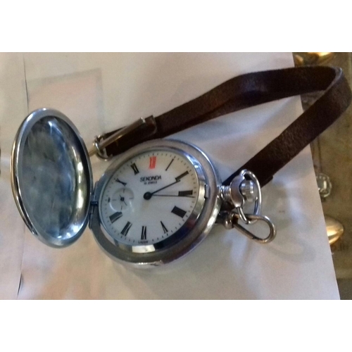 32 - Sekonda 18 jewel pocket watch in embossed white metal case, working order