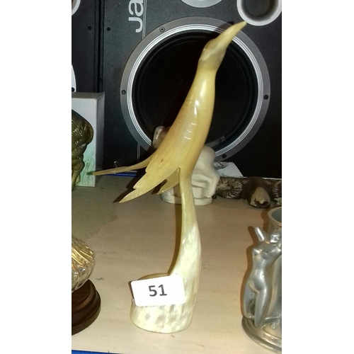 51 - 30 cm tall carved bone bird shaped ornament