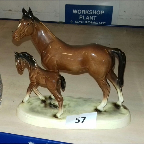 57 - Approx. 18 cm tall Hertwig, Katzhutte porcelain chestnut mare with foal ornament