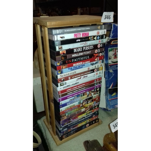 346 - 36 cm tall wooden DVD stand full of assorted DVDs