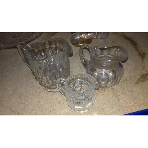 55 - 3 x assorted graduated glass jugs