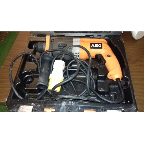 148 - AEG 650 watt 110 volt drill in hard case