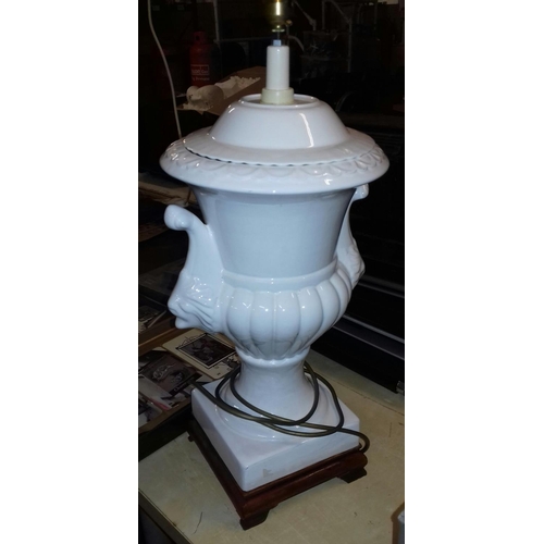 425 - 2 foot tall white ceramic table lamp on wooden base