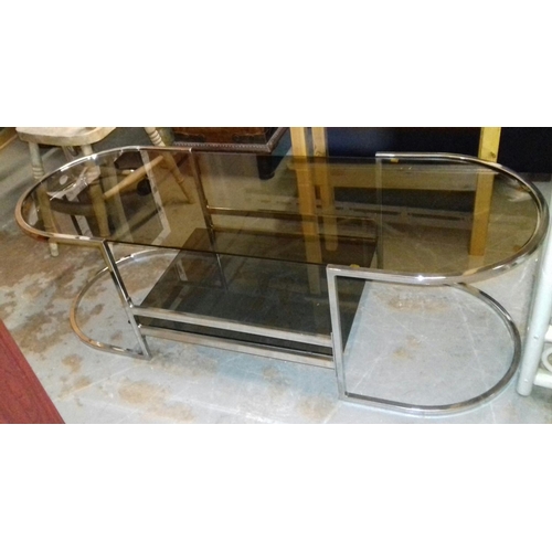 445 - 132 x 49 chrome and glass coffee table