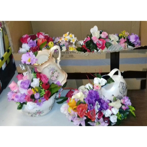 24 - Large amounts of assorted silk flower displays in bespoke pots etc.