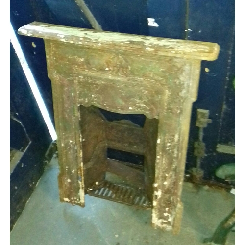 571 - Old cast iron fire surround and grate approx. 72 cm wide and 97 cm tall