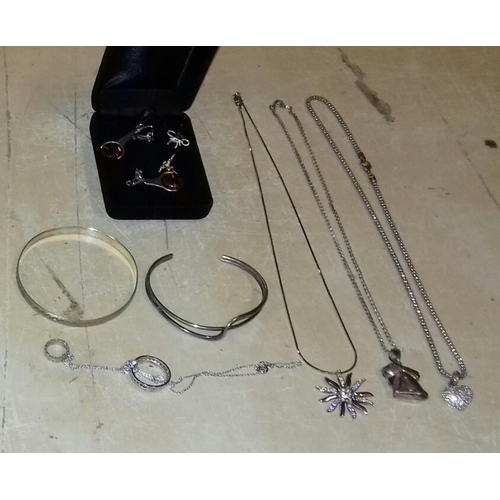 591 - Bundle of assorted sterling and hallmarked silver earrings, bangles, necklace etc.