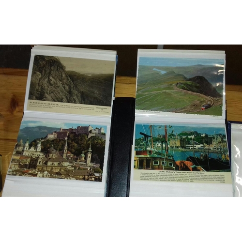 301 - 2 x photo albums with approximately 180 assorted postcards