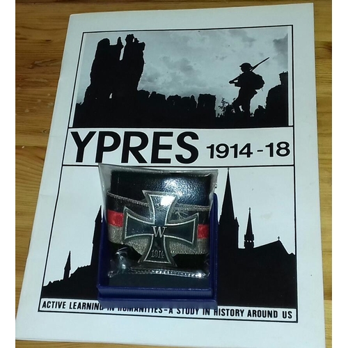 592 - 1914 Iron cross with ribbon in sealed pouch and vintage Ypres book