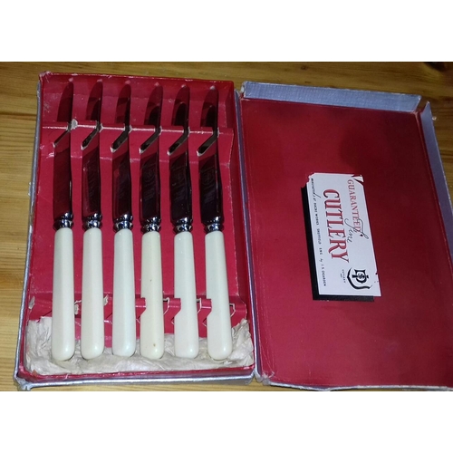 79 - Set of 6 stainless steel cake knives in original box