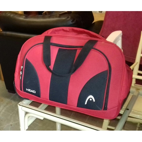 17 - Red and black head hand luggage bag on Wheels