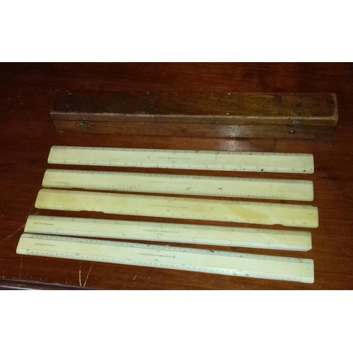 636 - 4 x Troughton and Simms and 1 x Elliot ivory/bone? Rulers in wooden case