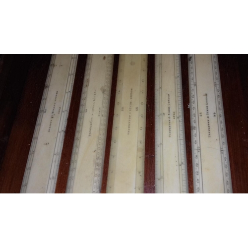 636 - 4 x Troughton and Simms and 1 x Elliot ivory/bone? Rulers in wooden case