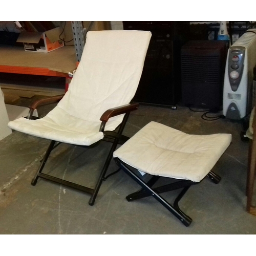 576 - Folding metal framed rocker chair and matching footstool