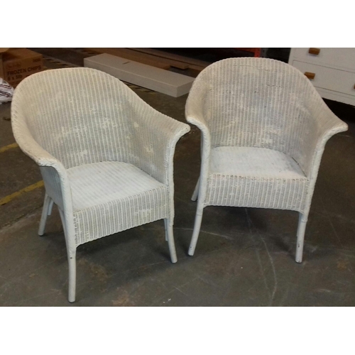 557 - Pair of white wicker Lloyd Loom style tub chairs