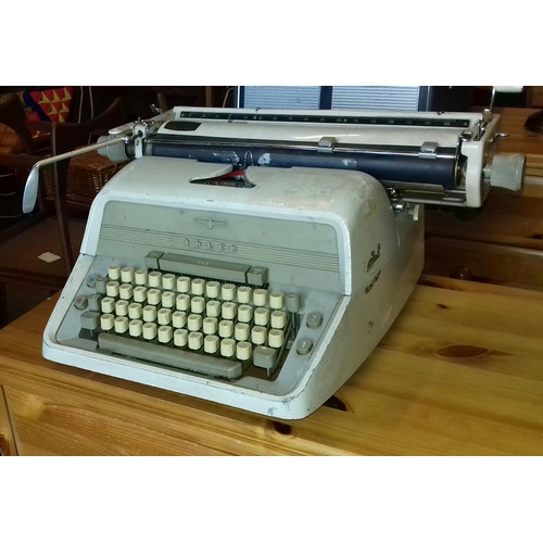 166 - Mid-century metal Adler typewriter