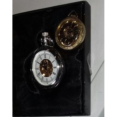 643 - Boxed heritage collection silver-plated pocket watch and smaller gold-coloured pocket watch