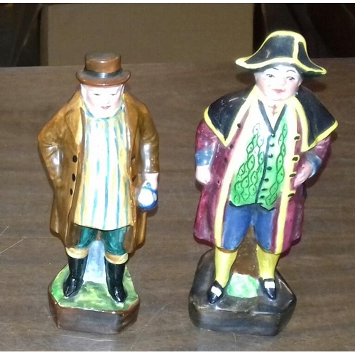 31 - Pair of 14 cm tall Dickensian ceramic figures