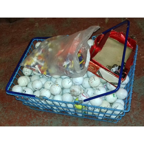 197 - Basket of assorted golf balls, tees etc.